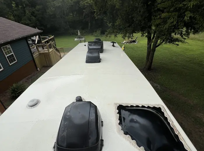 RV roof washed back to clean white from heavy staining