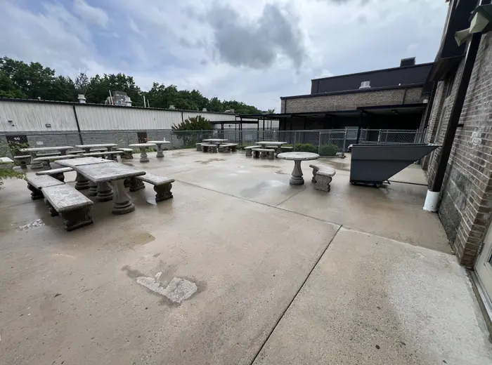 Cleaned concrete across a commercial picnic area