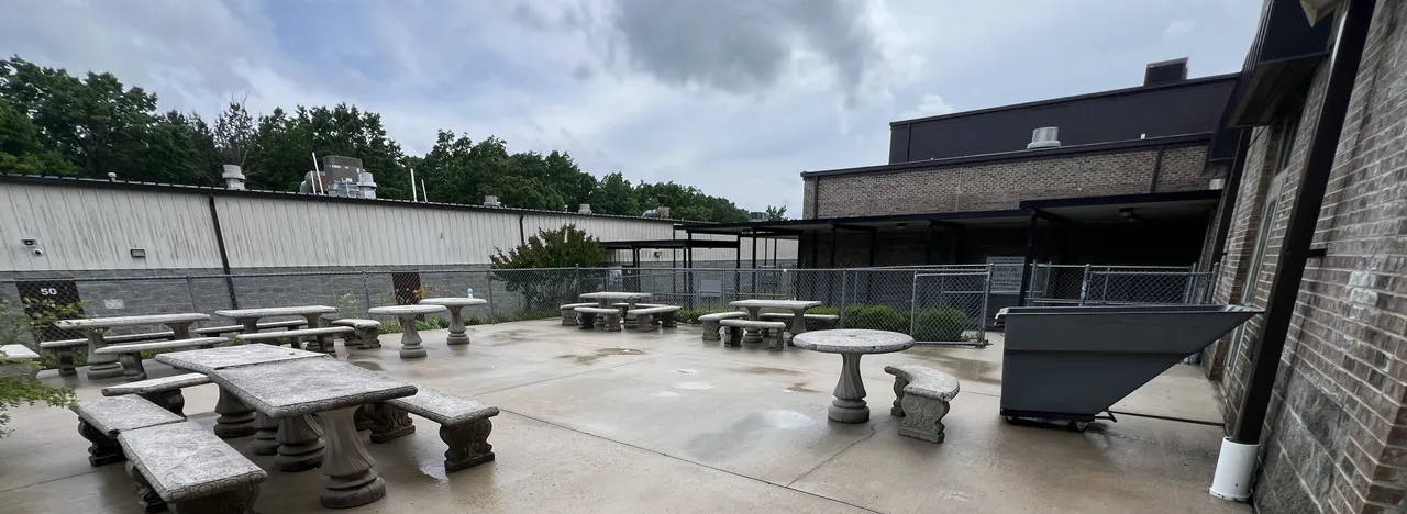 Cleaned concrete across a commercial picnic area